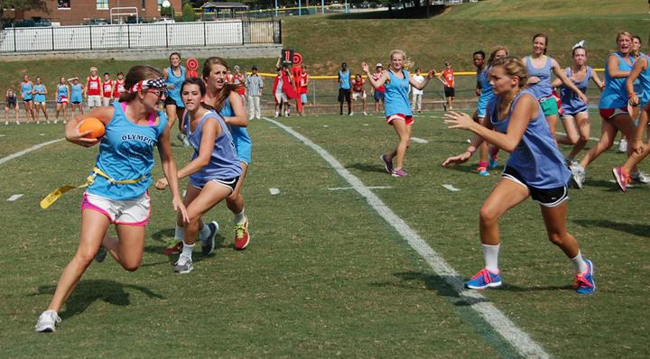 Powderpuff players fight for the ball