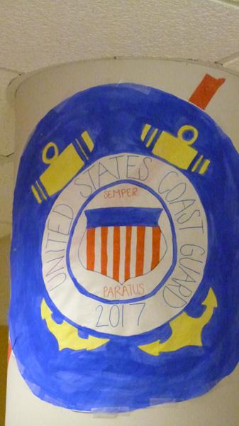 The Freshman proudly display their Coast Guard poster.