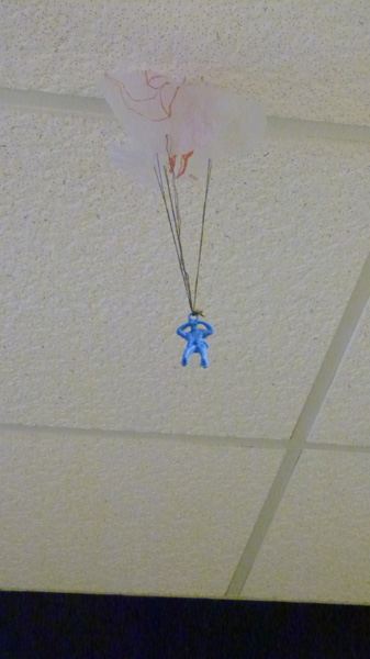 The Junior Class, as the U.S. Army, attached toy soldiers with parachutes to the ceiling along the 2nd floor hallway. 