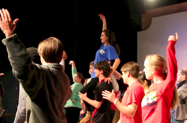 The cast of Mame struts their stuff during rehearsal.