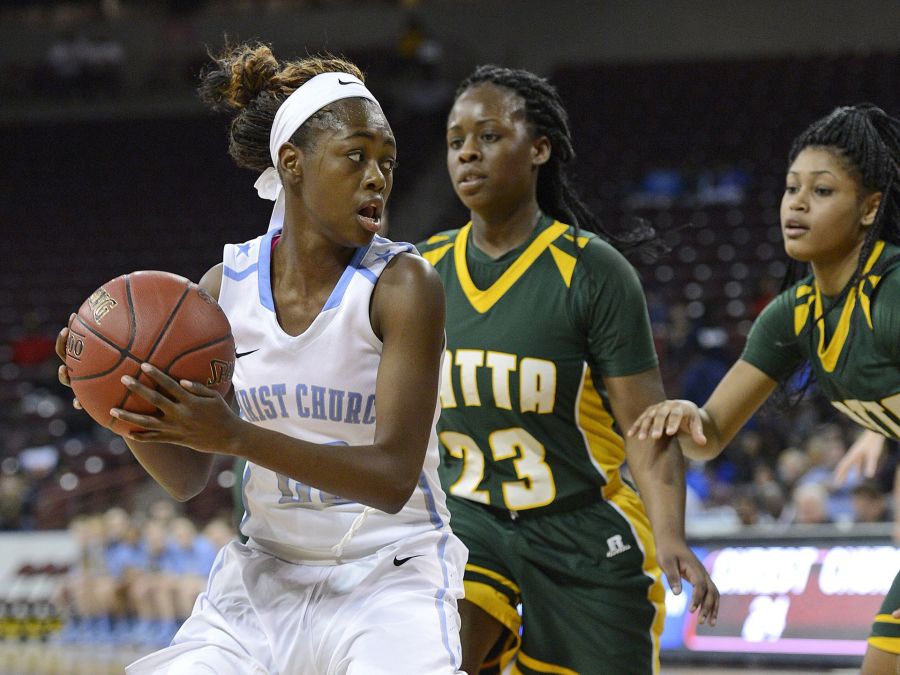 Junior guard Shayla is defended during the championship game.  (Bart Boatwright/Greenville News)