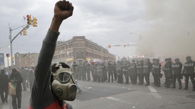 Baltimore Police attempt to suppress riots on Monday, April 27th. (AP Photo/Patrick Semansky)