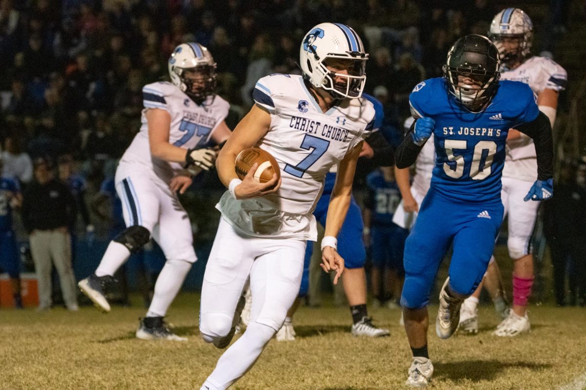 Quarterback Woods Windham rushing against St. Joes